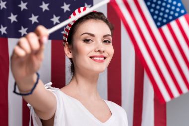 woman holding american flag clipart