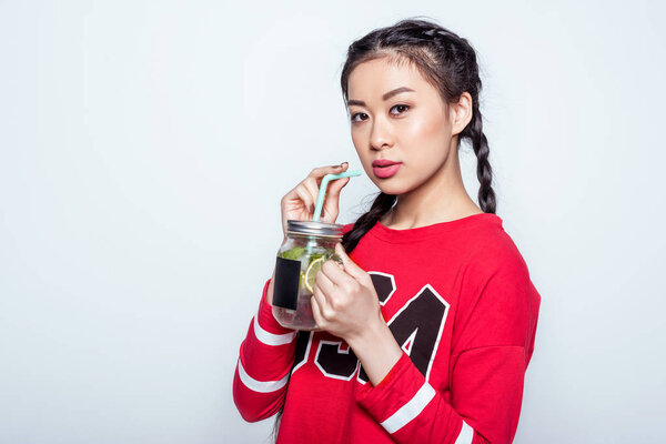 Girl drinking cold beverage 