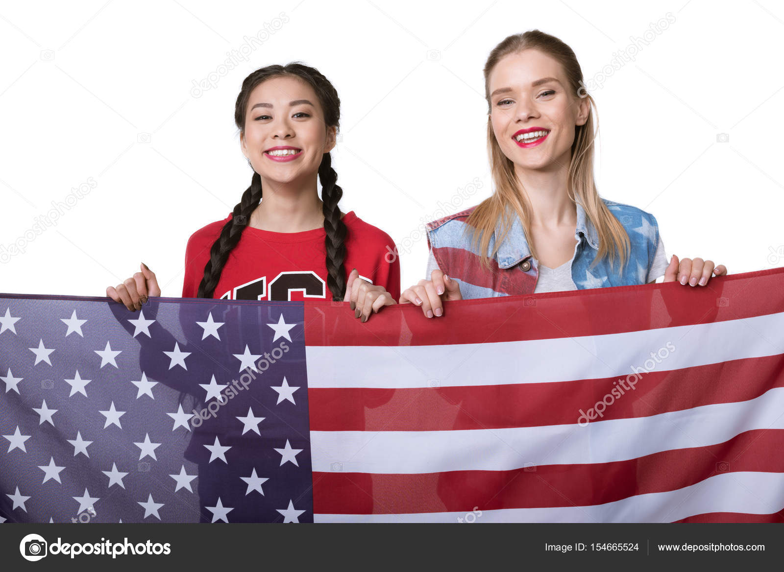 Multiethnic women holding flag of USA — Stock Photo © NatashaFedorova