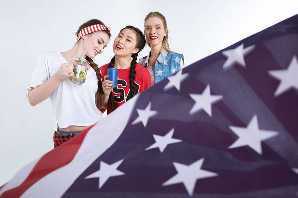 smiling girls with american flag