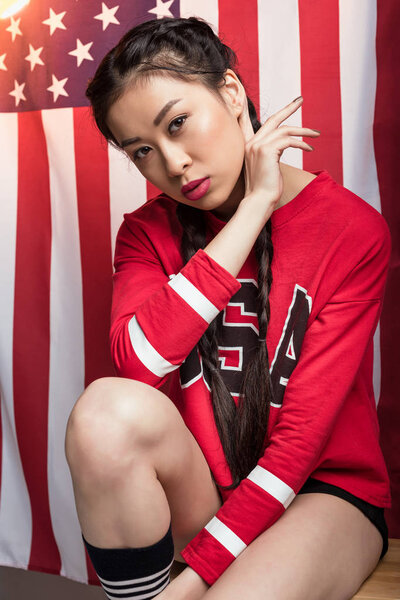 woman posing with USA flag