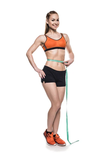 女运动员测量她的腰围 — 图库照片