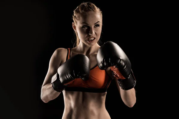 Sportswoman in boxing gloves — Stock Photo, Image