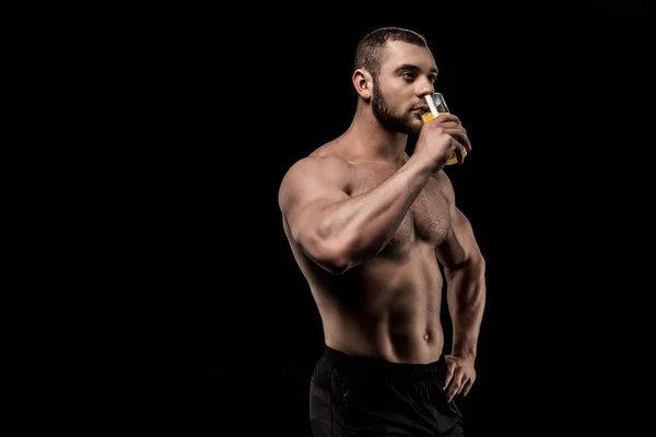 Sportive man with glass of juice — Stock Photo, Image