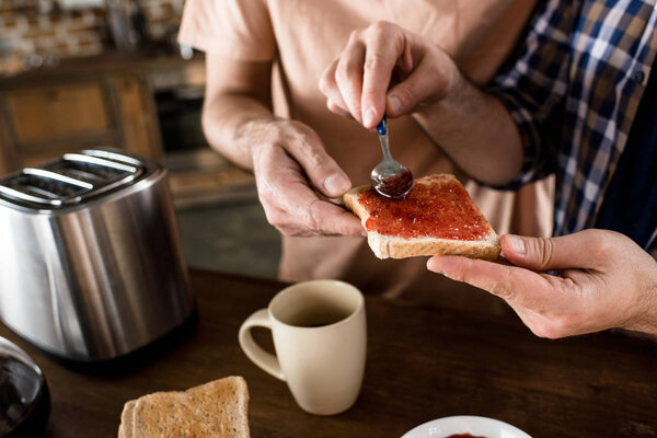 Gay couple having breakfast 