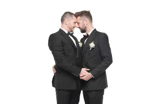 Homosexual couple in suits able to kiss — Stock Photo, Image