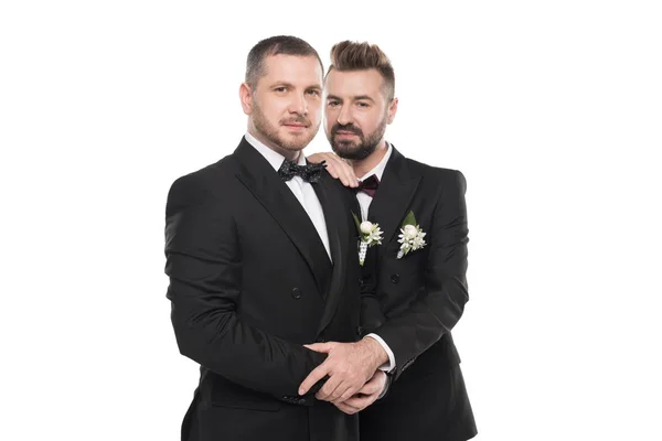 Couple of grooms embracing and looking at camera — Stock Photo, Image