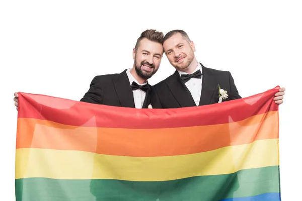 Homossexual casal segurando lgbt bandeira — Fotografia de Stock