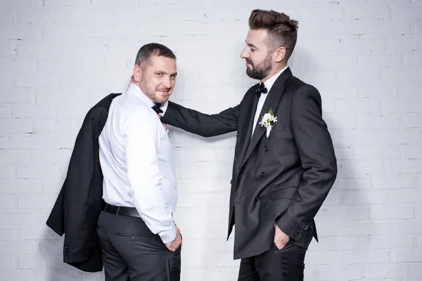 Couple of grooms in tuxedos — Stock Photo, Image