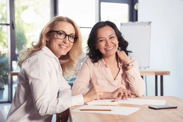 Smiling businesswomen in office — Stock Photo, Image