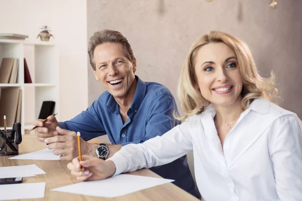 Smiling middle aged coworkers — Stock Photo, Image