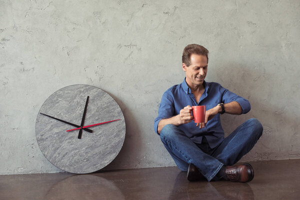 mature man drinking coffee