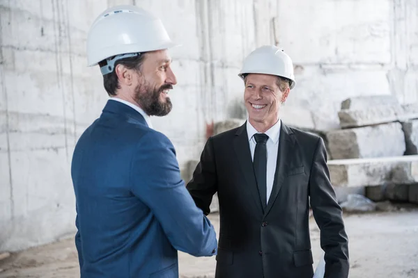 Architects shaking hands — Stock Photo, Image