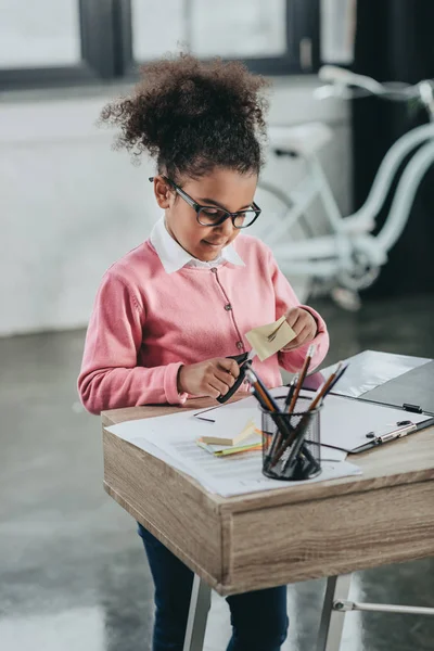 Cute little girl with scissors — Stock Photo, Image