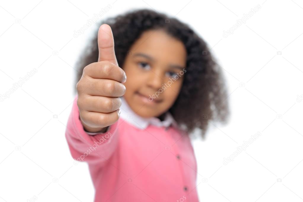 african american girl showing thumb up