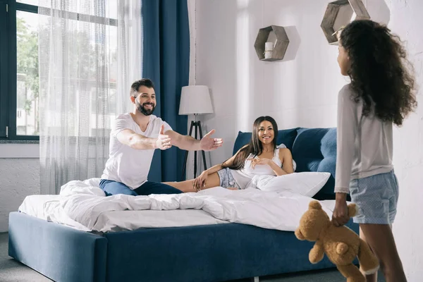 Happy family in bedroom — Stock Photo, Image