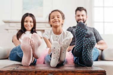 Family feet in socks clipart