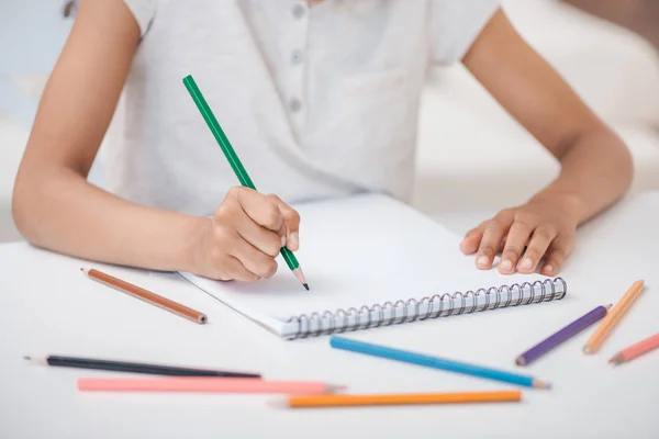 Girl drawing with pencils — Stock Photo, Image