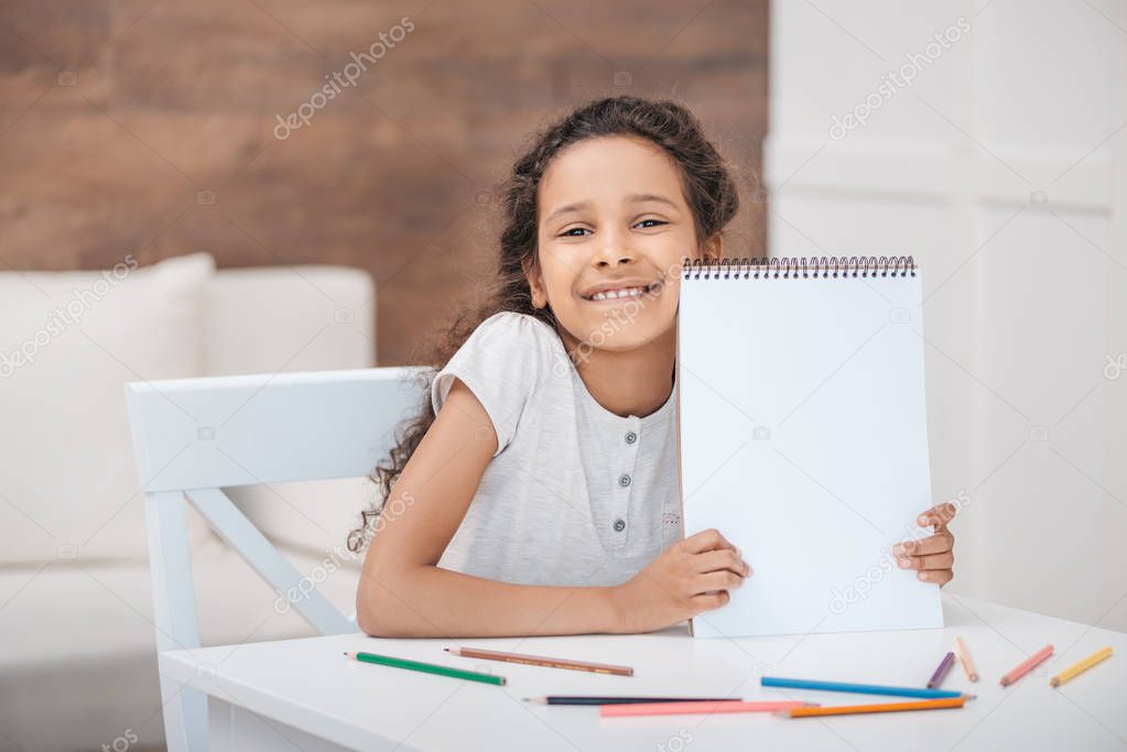 girl with drawing album
