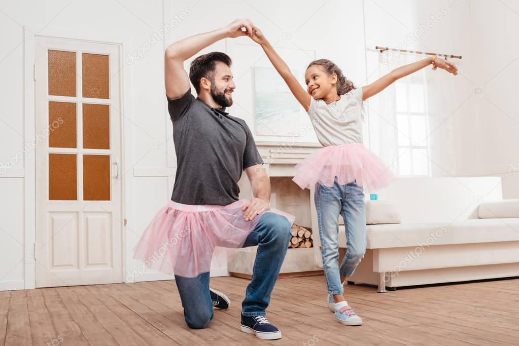 family dancing at home