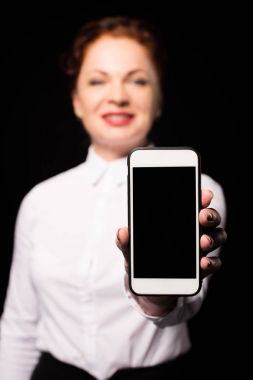 Woman showing smartphone screen clipart