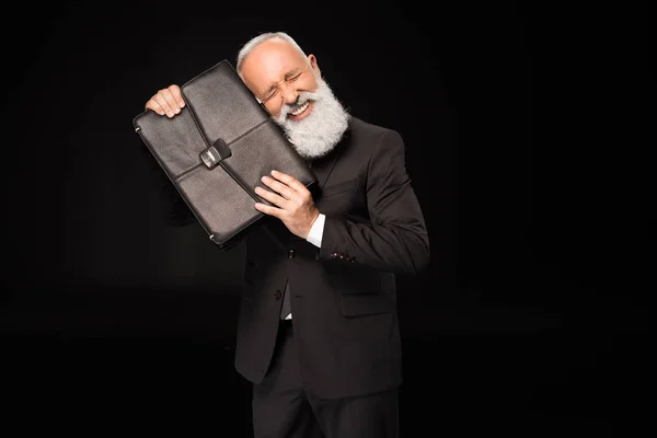 Excited businessman holding briefcase — Stock Photo, Image