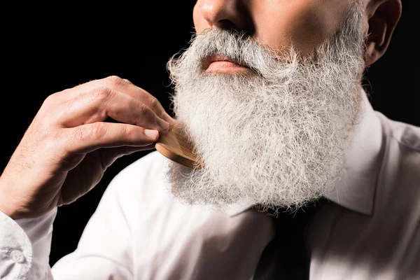 Man combing long beard — Stock Photo, Image