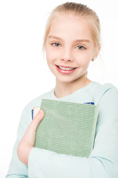 Schoolgirl holding books — Stock Photo, Image