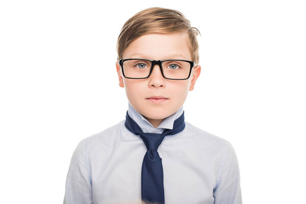 serious boy in eyeglasses