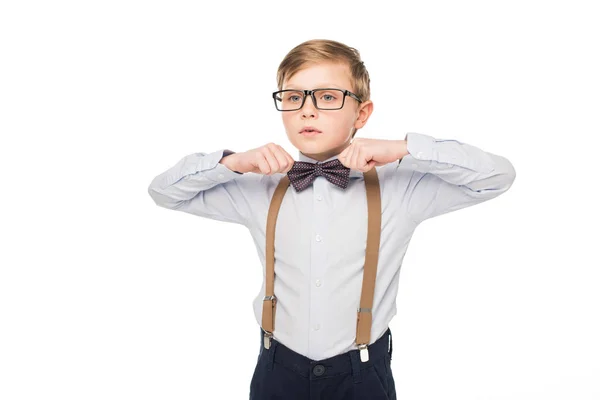 Little boy adjusting bow tie — Stock Photo, Image