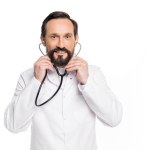 Middle aged doctor with stethoscope