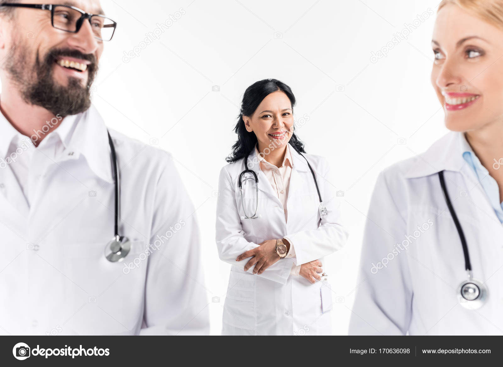 Professional doctors in white coats Stock Photo by ©NatashaFedorova