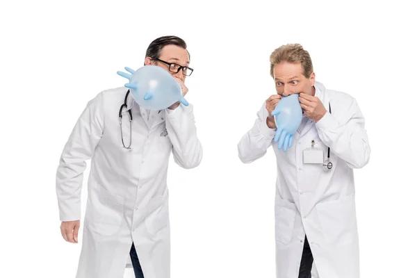 Doctors having fun with medical gloves — Stock Photo, Image