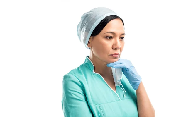 Pensive asian surgeon — Stock Photo, Image