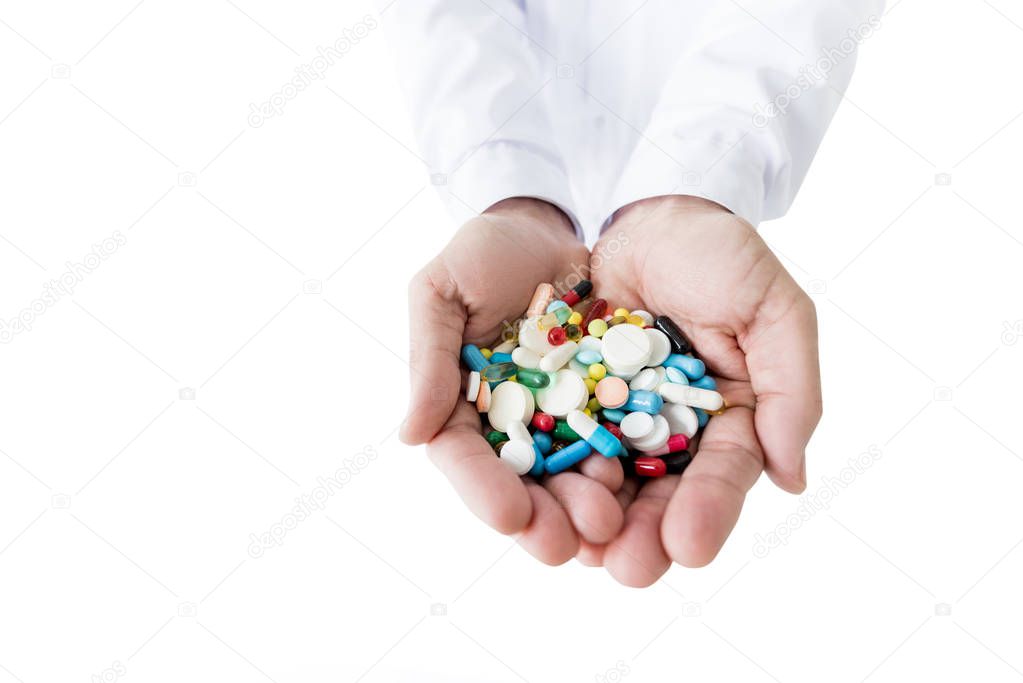 doctor holding pills