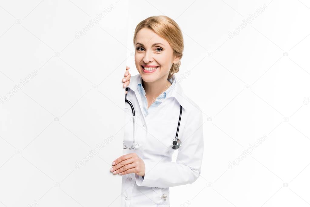 doctor holding blank banner