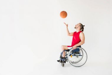 Disabled sportsman playing basketball clipart