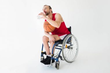 Disabled basketball player drinking water clipart