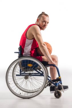 sportsman in wheelchair with basketball clipart