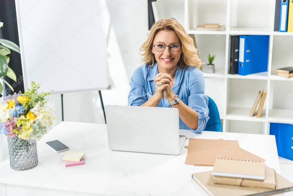 attractive businesswoman at workplace