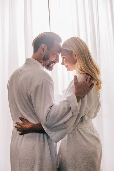 Side View Happy Beautiful Mature Couple Love Wearing Bathrobes Smiling — Stock Photo, Image