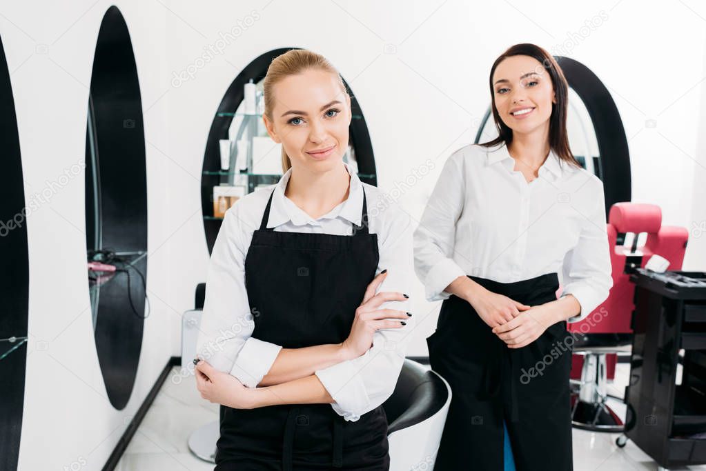 beautiful hairdressers at salon during working time