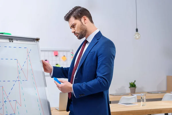 Serious Businessman Looking Diagram Chart — Stock Photo, Image