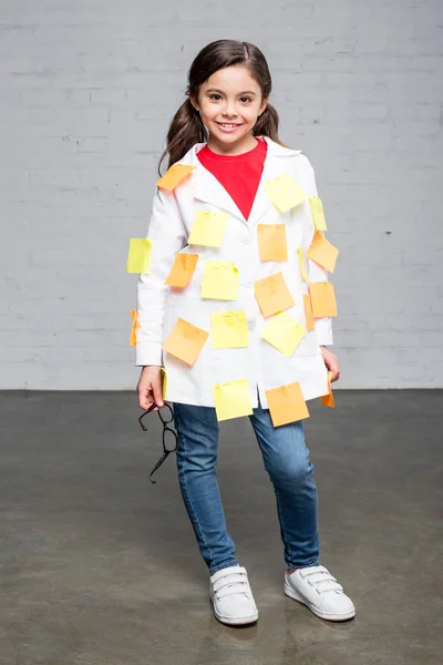 Girl with sticky notes — Stock Photo