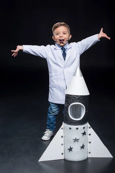 Little boy with rocket — Stock Photo