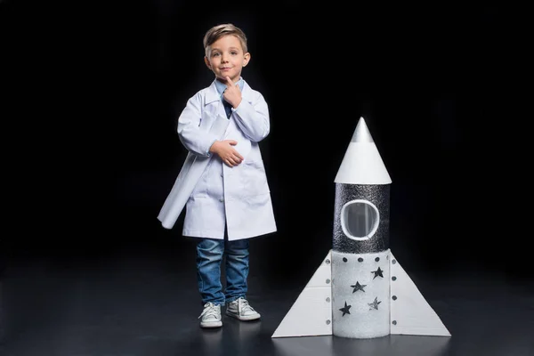 Little boy with rocket — Stock Photo