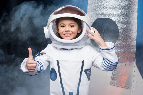 Girl in astronaut costume — Stock Photo