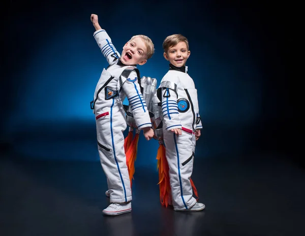Kids in space suits — Stock Photo
