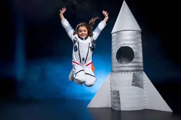 Girl in astronaut costume — Stock Photo
