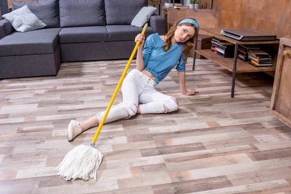 Young woman with mop — Stock Photo